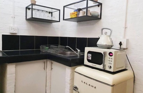 Downtown Johannesburg Apartment | Discover Craftsmen's Ship Maboneng: Family-Friendly Retreat