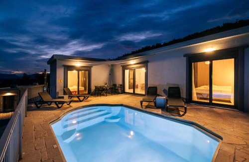 Mavrovouni Villa | Oceanfront Cranae Tranquil Villas with Pool & Family Fun