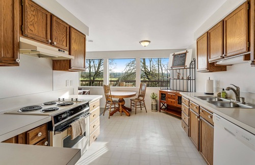 Lacey House | Idyllic Creekside Retreat with Kayaks, Fireplace & Pet Friendly