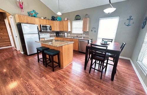 Cedar Lane House | Creekside Getaway: Ideal for Fishing and Family Fun