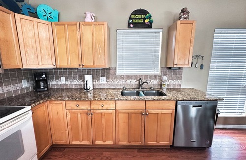 Cedar Lane House | Creekside Getaway: Ideal for Fishing and Family Fun