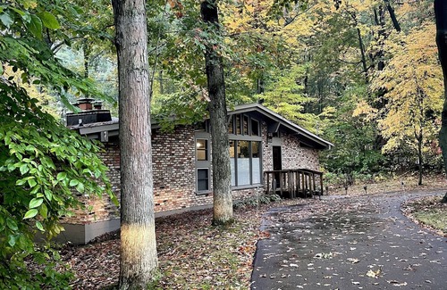 Fruitport House | Creekside: Secluded Sanctuary with Ocean View & Hot Tub