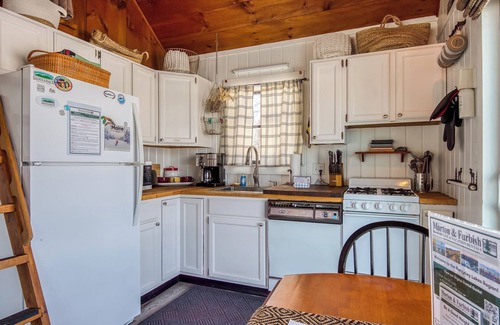 Rangeley Cottage | Pet-Friendly Cabin with Lake View in Downtown Rangeley
