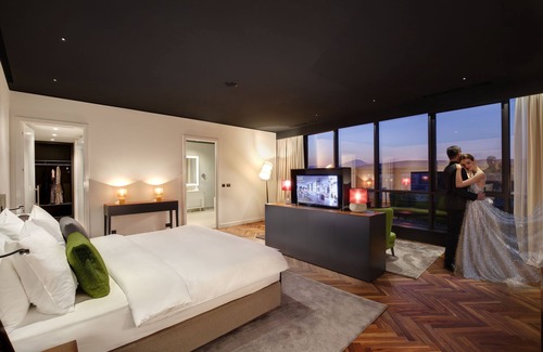 Podgorica Hotel | Experience CUE Podgorica: 4-Star Retreat with Pool & Spa