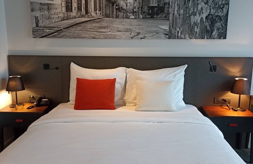 Podgorica Hotel | Experience CUE Podgorica: 4-Star Retreat with Pool & Spa