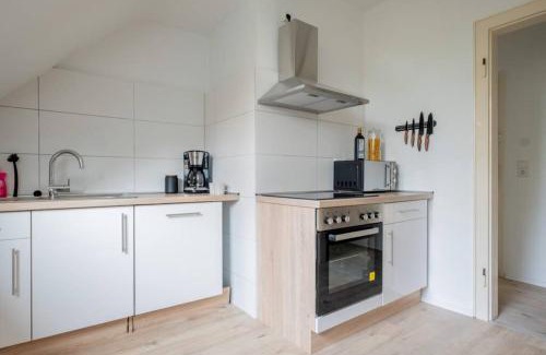 Holsterhausen Apartment | Convenient Apartments am Uniklinikum for Family Stays