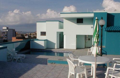Macae Apartment | Oceanfront Crystal Apart Hotel with Pool & Hot Tub Access