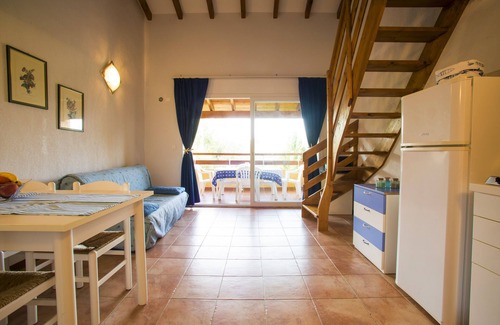 Ghisonaccia Resort | Unwind by the Crystal Clear Sea: Family-Friendly Apartments