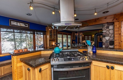 Tomahawk Cottage | Unforgettable Northwoods Sunset Lake House with Pool & Views