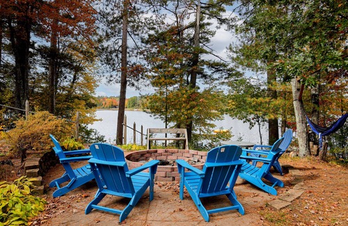Tomahawk Cottage | Unforgettable Northwoods Sunset Lake House with Pool & Views