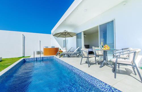 Ueno Villa | Elegant Crystal Villa Bayside: Oceanfront Retreat Awaits