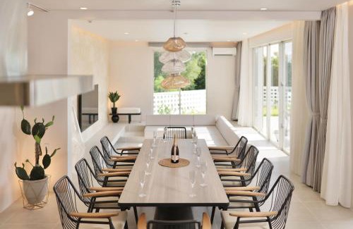 Ueno Villa | Elegant Crystal Villa Bayside: Oceanfront Retreat Awaits