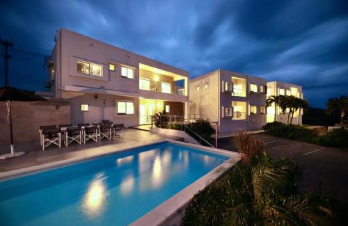 Miyakojima Apartment | Relax at Crystal Villa Imgya: Poolside Retreat with 8.4/10