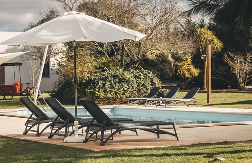 Carvalhal House | Inviting Poolside Retreat with Ocean View & Spa Amenities