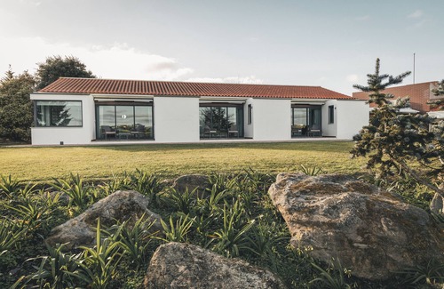 Carvalhal House | Inviting Poolside Retreat with Ocean View & Spa Amenities