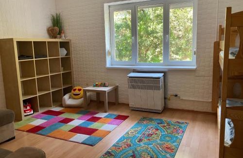 Kelenfold Apartment | Tranquil Green Oasis with Child-Friendly Amenities
