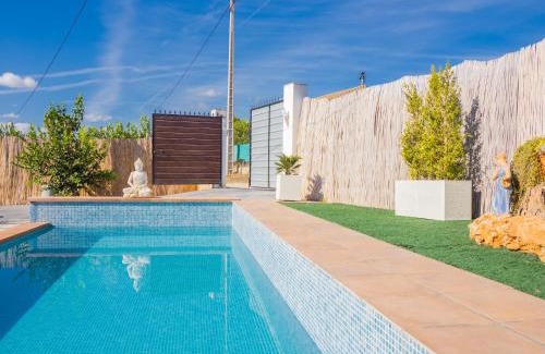 Cartama House | Discover Cubo's Casita Bolaño: Family-Friendly Getaway