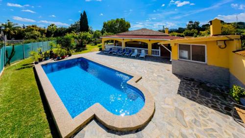 Alhaurin de la Torre House | Experience Cubo's Finca Megan: Family-Friendly with Pool