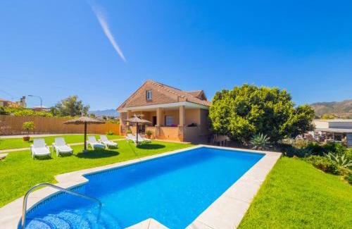Alhaurin de la Torre Villa | Relax at Cubo's Villa Plumaria de Alhaurin with Pool Access