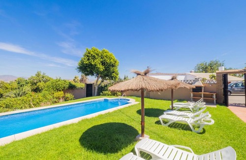 Alhaurin de la Torre Villa | Relax at Cubo's Villa Plumaria de Alhaurin with Pool Access