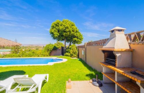 Alhaurin de la Torre Villa | Relax at Cubo's Villa Plumaria de Alhaurin with Pool Access