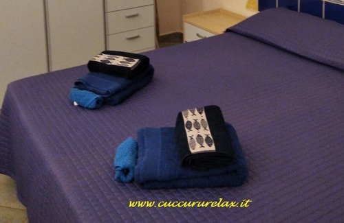 Orosei Apartment | Cuccuru Relax - Your Oasis with Ocean Views and Pool Access