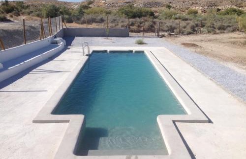 Baza Apartment | Discover Cuevas Alcobas: Family-Friendly with Pool Access