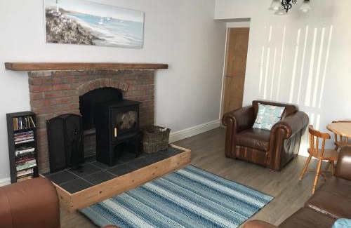 Port Logan Apartment | Cozy Curlew Cottage with Oceanfront Views & Pet Friendly