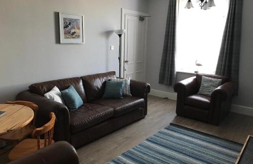 Port Logan Apartment | Cozy Curlew Cottage with Oceanfront Views & Pet Friendly