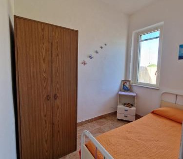 Le Castella Apartment | Unwind at Curmo Beach: Pet Friendly & Oceanfront Bliss