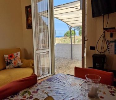 Le Castella Apartment | Unwind at Curmo Beach: Pet Friendly & Oceanfront Bliss