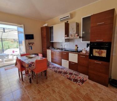Le Castella Apartment | Unwind at Curmo Beach: Pet Friendly & Oceanfront Bliss