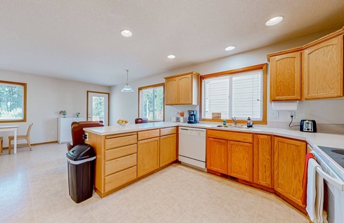 Gresham House | Relaxing Custom-Built Home with Spa & Greenspace Access