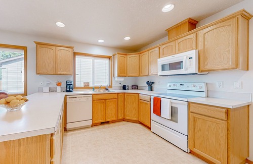 Gresham House | Relaxing Custom-Built Home with Spa & Greenspace Access