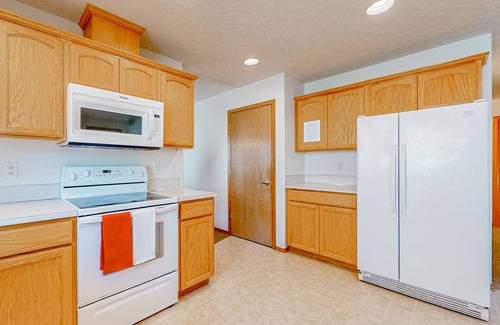 Gresham House | Relaxing Custom-Built Home with Spa & Greenspace Access
