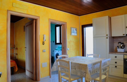 Province of Cagliari Apartment | Charming Central Apartment with Ocean View & Spa Access