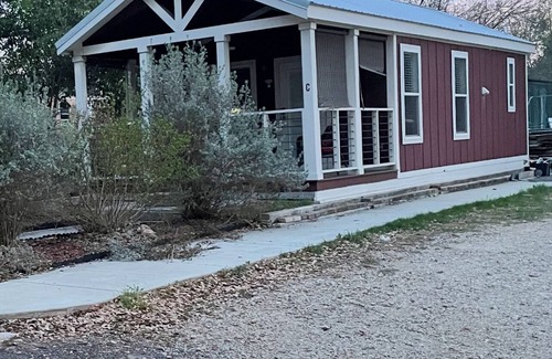 San Marcos Cottage | Cute Red 1-bedroom cottage in San Marcos. Dog friendly. Room Service