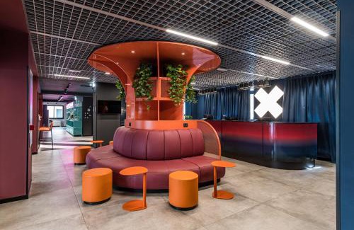 San Salvario Hotel | Discover CX Turin Marconi: Pet-Friendly with Pool & Dining