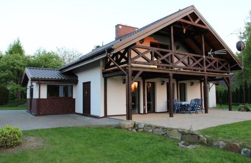 Ilawa House | Experience Czar Jezioraka: Ocean View & Private Beach Stay