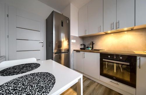 Psie Pole Apartment | Cozy Czartoryskiego Apartment - Child-Friendly Retreat