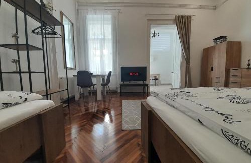 Baja Apartment | Exceptional Stay at Déri Kert Apartmanház with Family Amenities