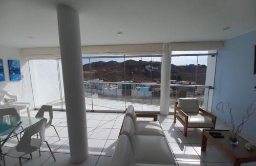 Pucusana Apartment | Oceanfront Duplex with Breathtaking Bay Views in Naplo