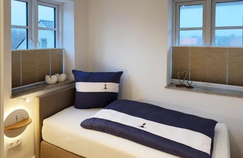 Wittduen Apartment | Discover Family-Friendly Comfort at Dünenperle Dünental