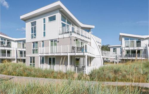 Travemuende Apartment | Experience Dnenvilla: 5-Star Stay with Family-Friendly Dining