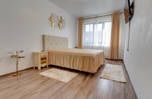 Tractorul Apartment | Top-Rated D&C Apartment: Family-Friendly with Kitchen Access
