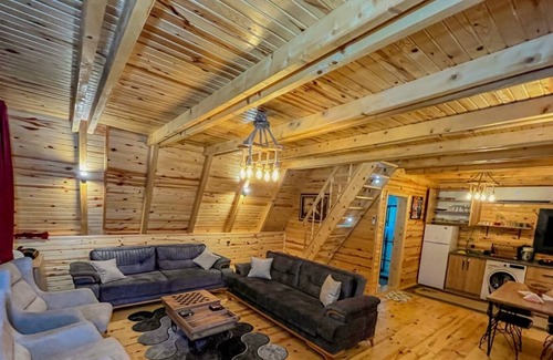 Ardesen Ski Chalet | Relax in a Scenic Bungalow with Hot Tub & Cozy Fireplace