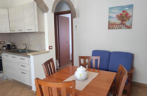 Tancau Sul Mare Apartment | Discover Family-Friendly Comfort at da Tanja with Ocean Views