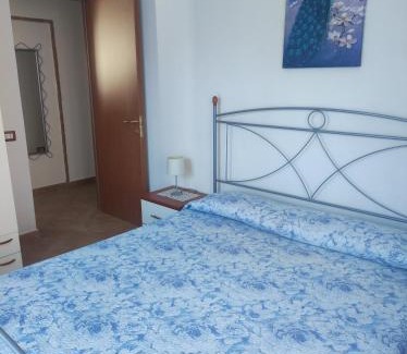 Tancau Sul Mare Apartment | Discover Family-Friendly Comfort at da Tanja with Ocean Views