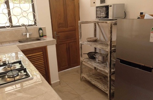 Diani Beach Apartment | Discover Dacha Diani Paradise with Poolside Relaxation