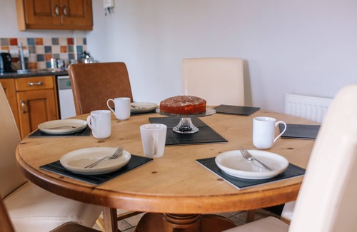 Malpas Cottage | Discover Dairyman's Cottage: Family-Friendly Rural Retreat